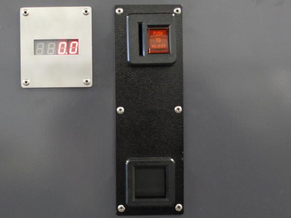 Coin validator including housing